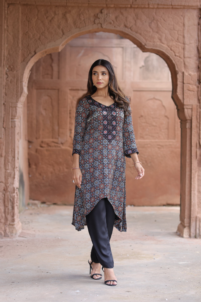 Invest in this Pink embroidered high low kurti to look gorgeous